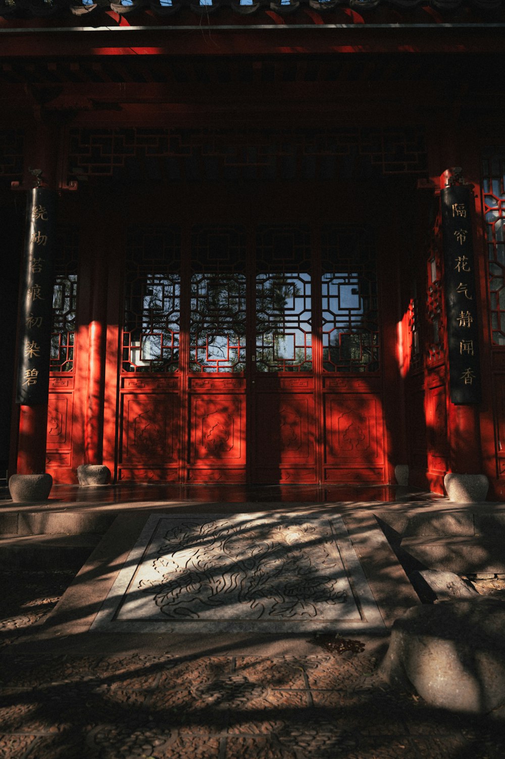 a red building with lots of windows in it