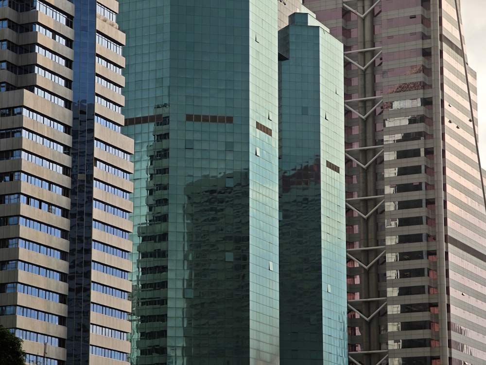 a group of tall buildings next to each other