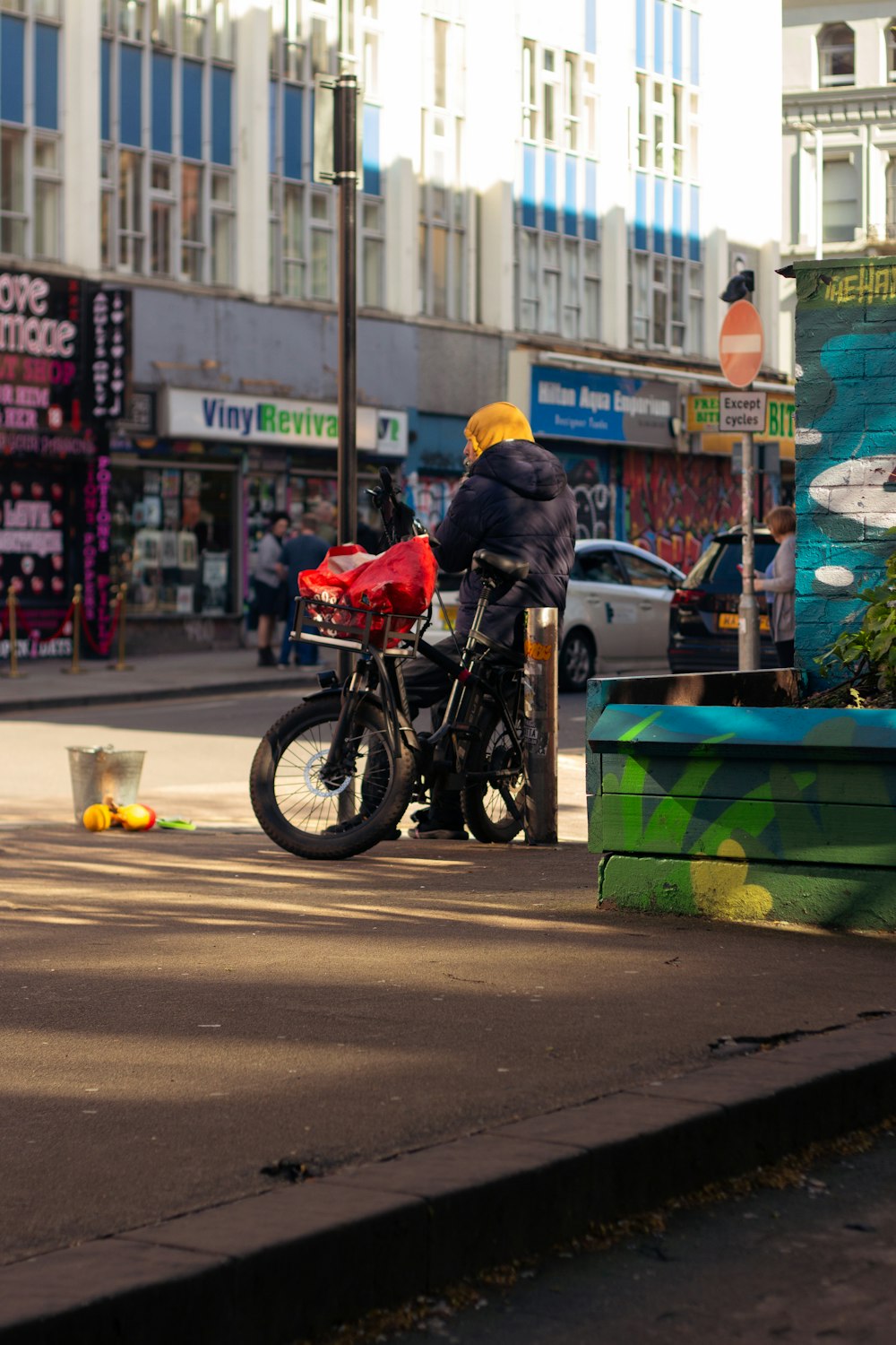 a person riding a motorcycle on a city street