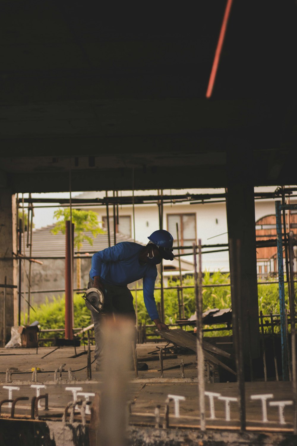 a man working on a building under construction