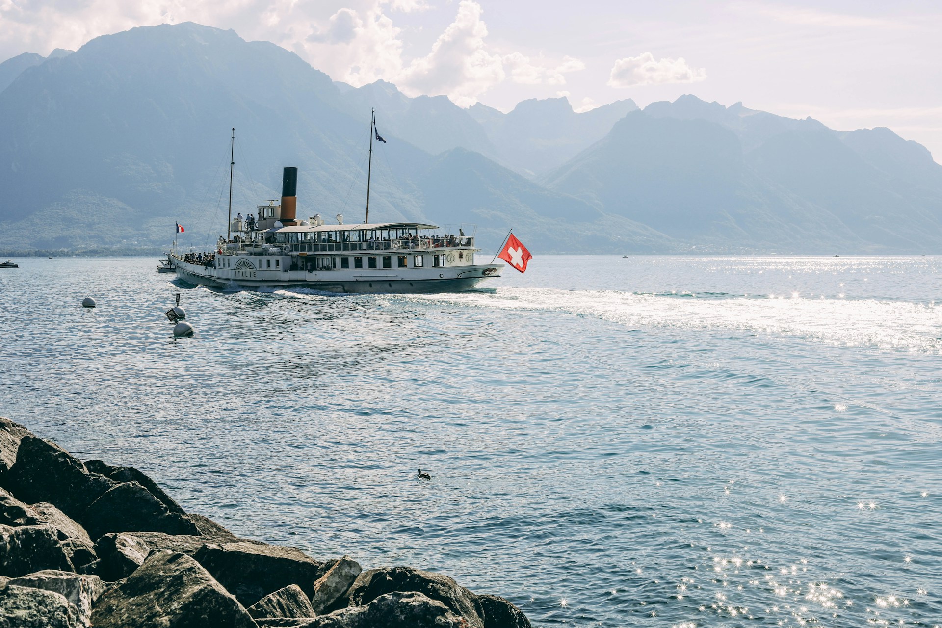 a large boat traveling across a large body of water