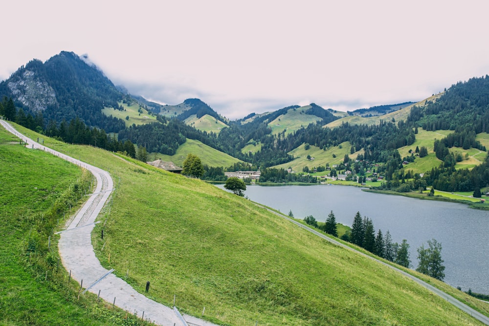 a scenic view of a lake and mountains