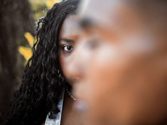 a close up of a person with long hair