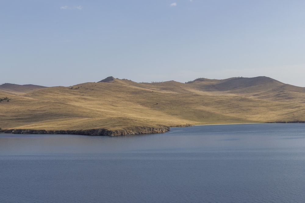 a large body of water surrounded by mountains