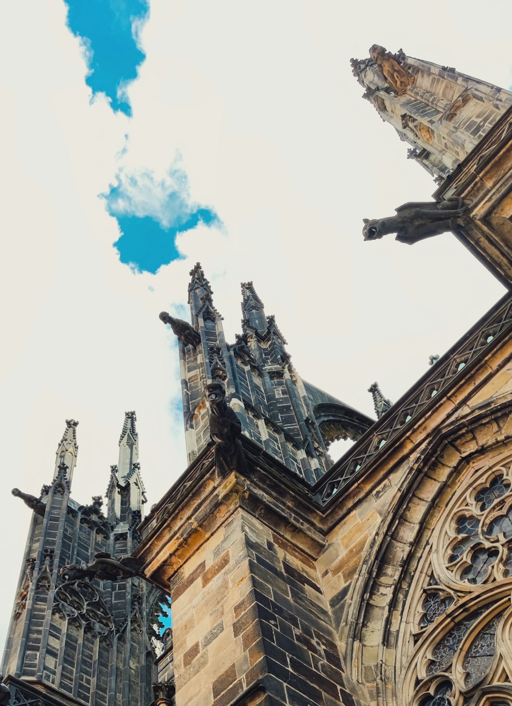 a very tall cathedral with a sky in the background