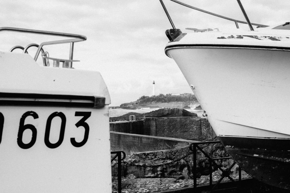 a couple of boats parked next to each other