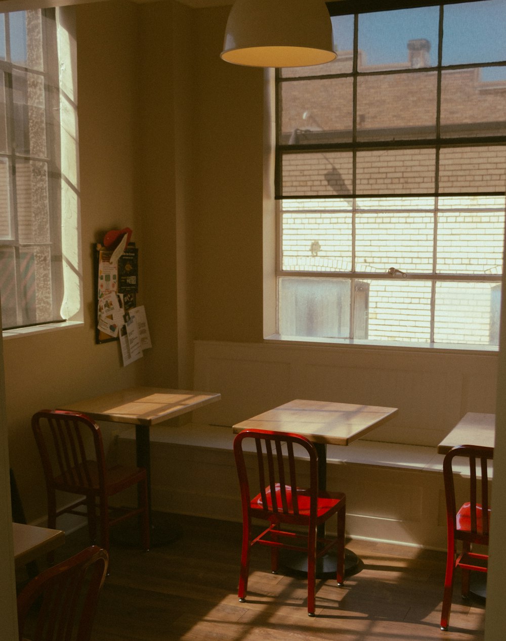 a table and two chairs in a room