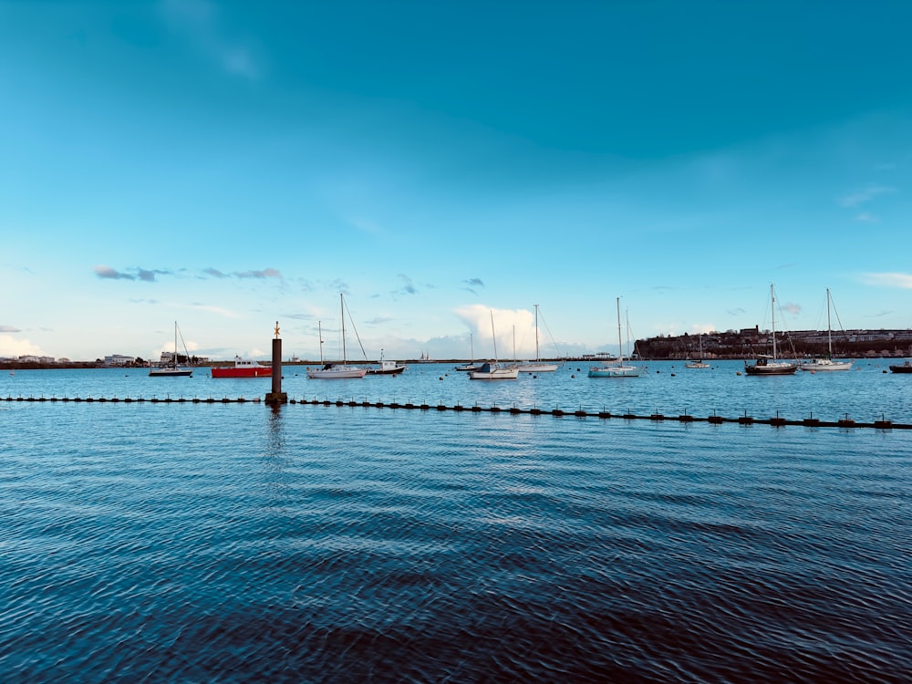 a body of water with boats in the distance