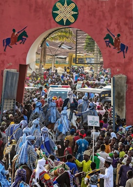 a large group of people standing in front of a building