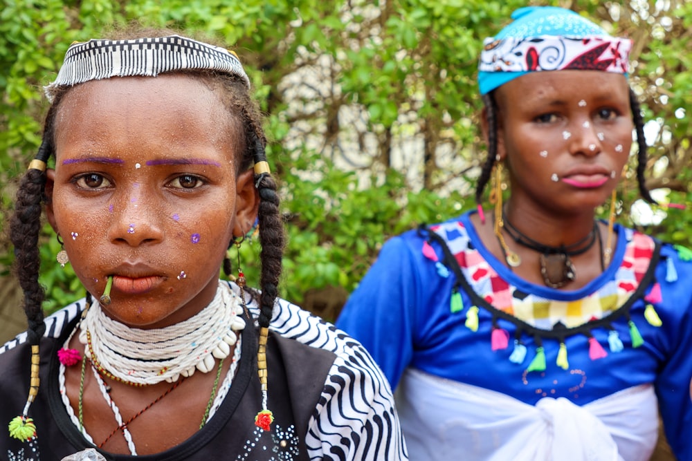 a group of women standing next to each other