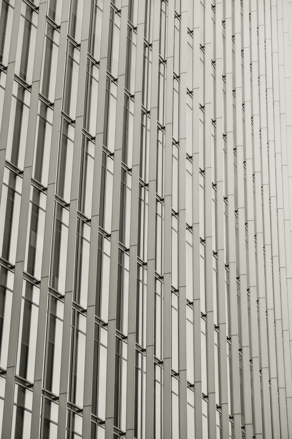 a black and white photo of a tall building