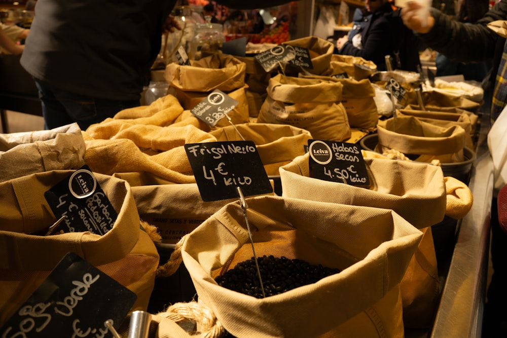 a bunch of bags filled with dirt sitting on top of a table