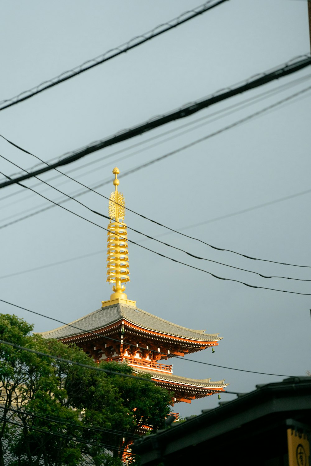 a tall building with a golden tower on top of it