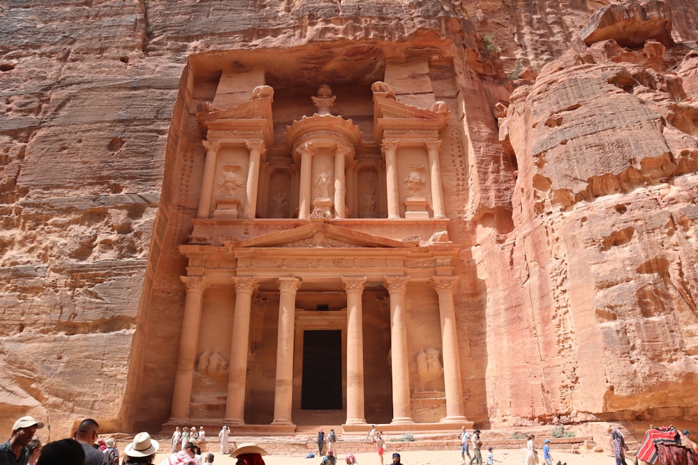 a group of people standing in front of a building