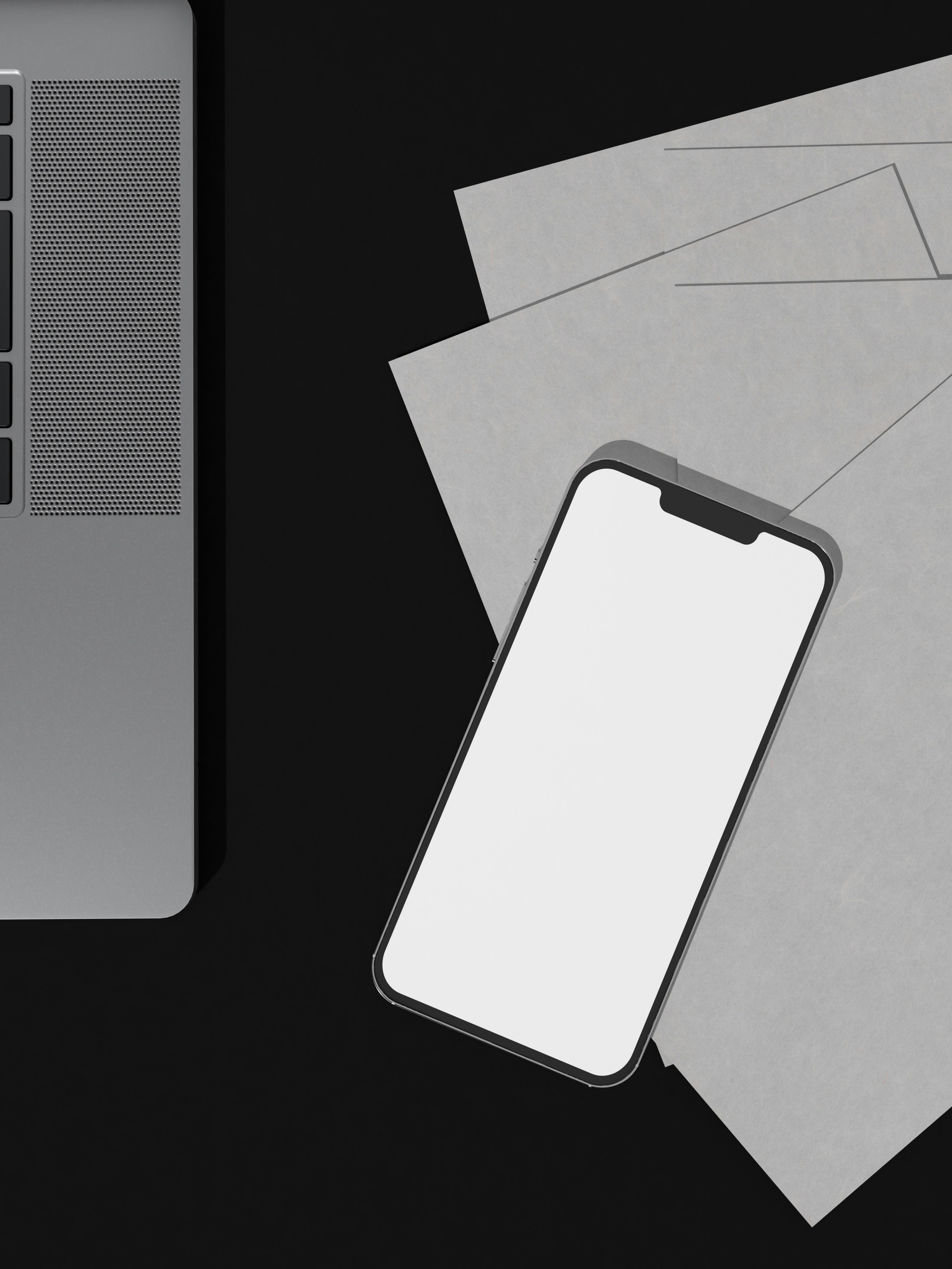 un computer portatile seduto sopra una scrivania