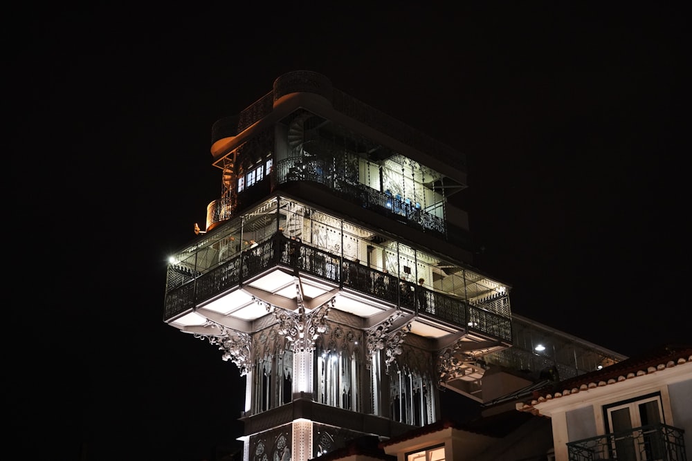 a tall tower with a clock on the top of it