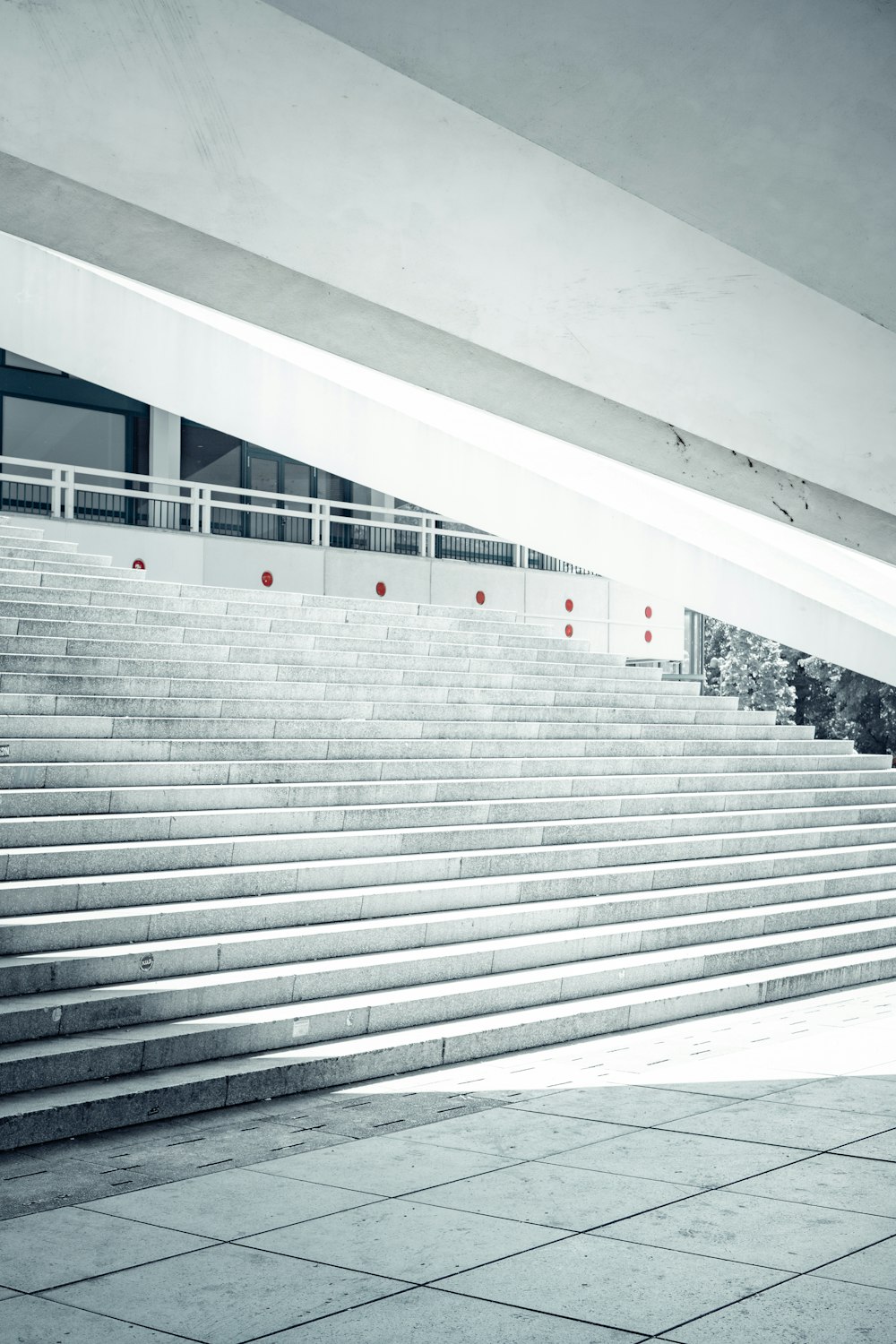 a man riding a skateboard down a set of stairs