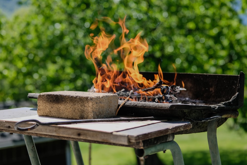 a grill that has some kind of fire on it