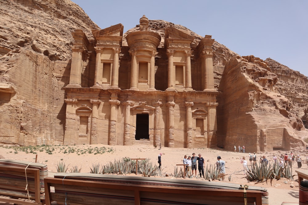 a group of people standing in front of a building