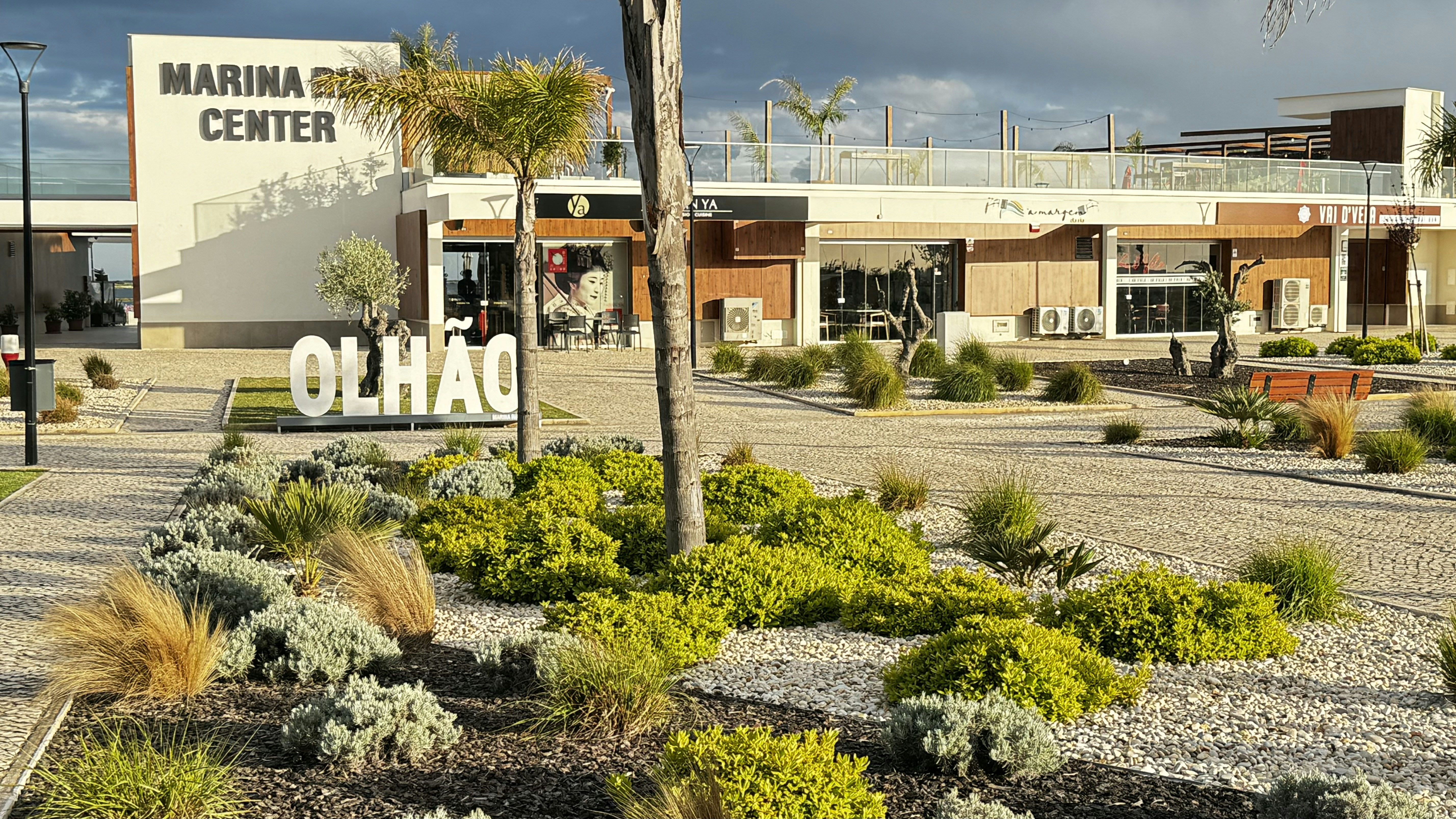 a building with a sign that says marina center