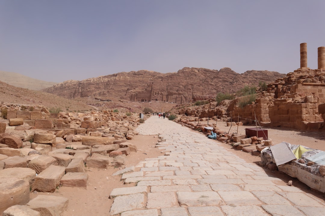 a stone road in the middle of a desert,