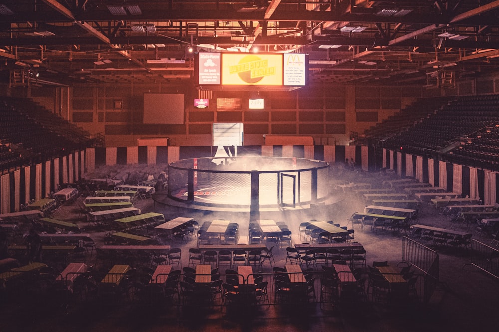 a large round table surrounded by tables and chairs