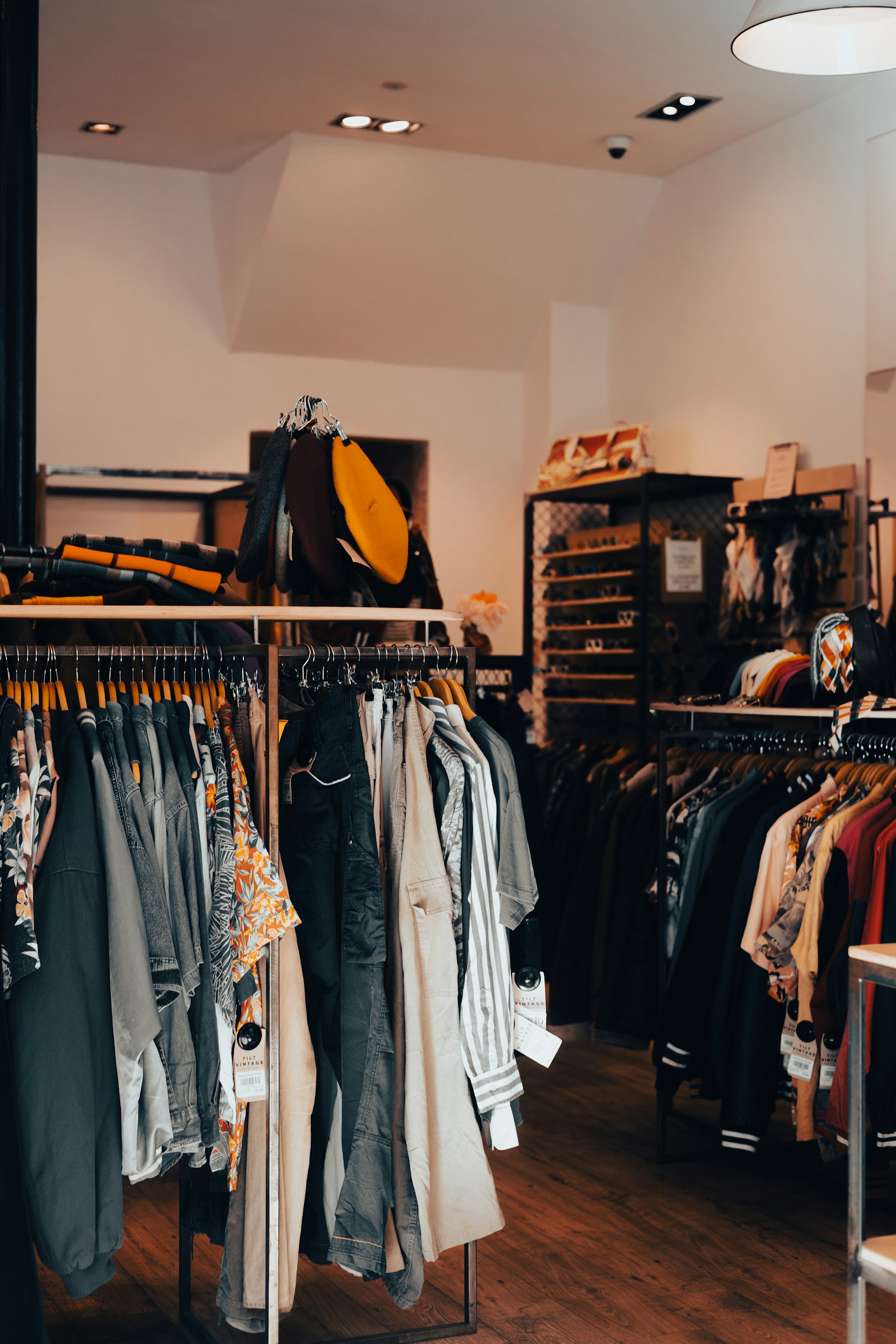 a rack of clothes in a clothing store