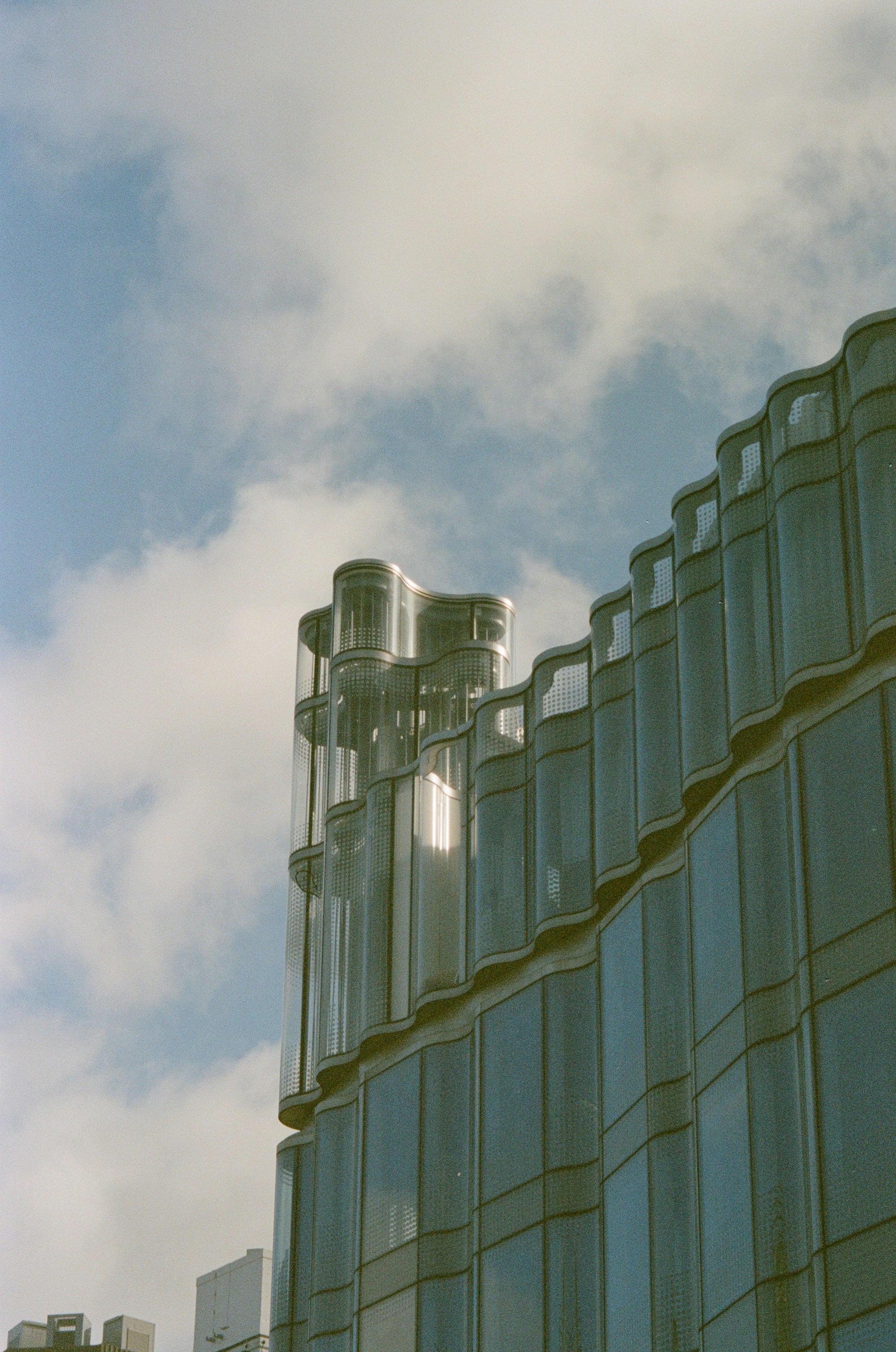 a tall building with a lot of windows on top of it
