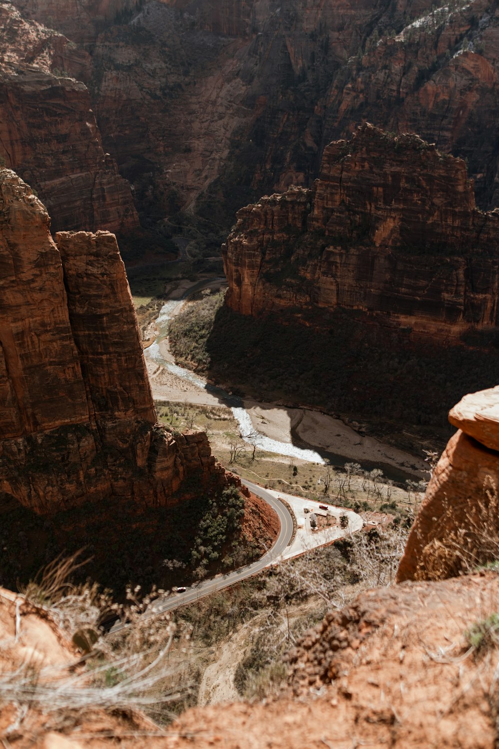 a scenic view of a canyon with a river running through it