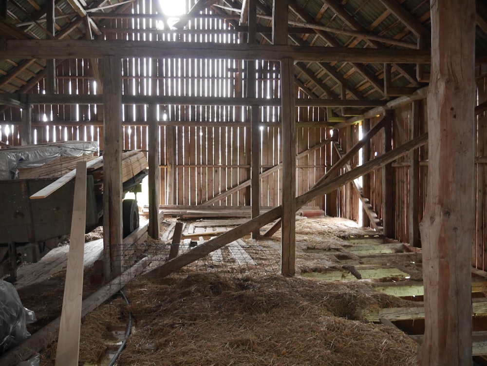 a barn with hay inside of it