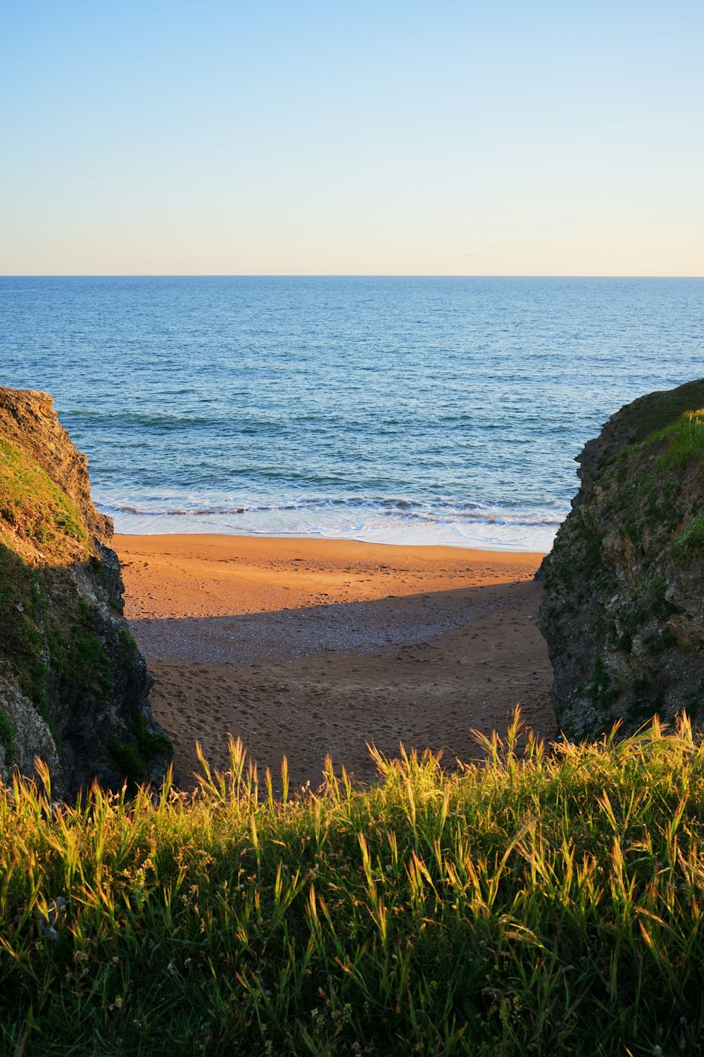 a view of the ocean from a beach