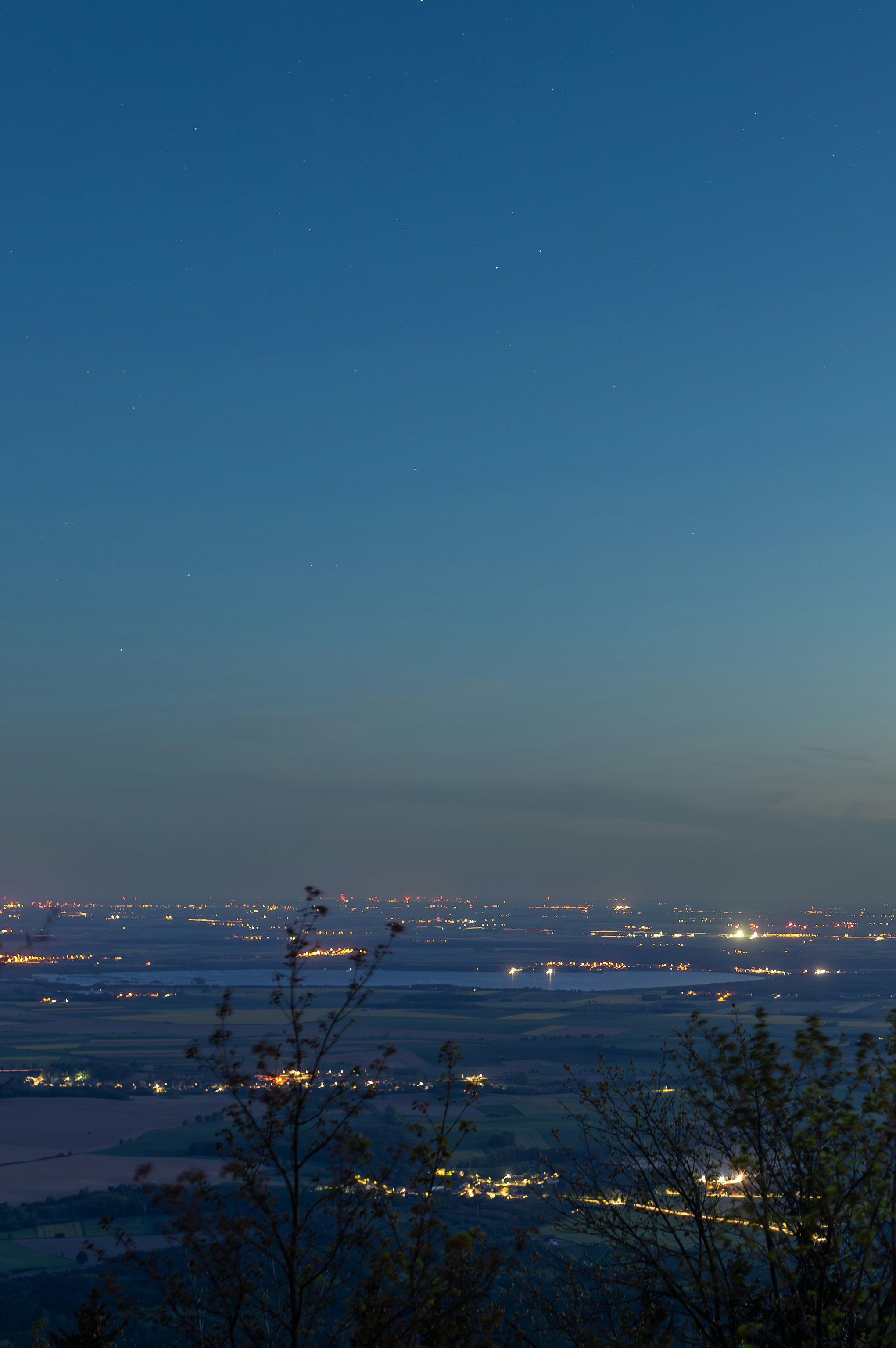 A view of a city at night from a hill photo – Free Travel Image on Unsplash