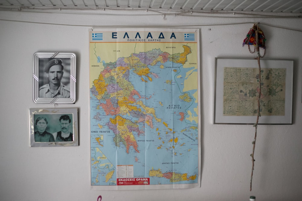 a map of greece hanging on a wall