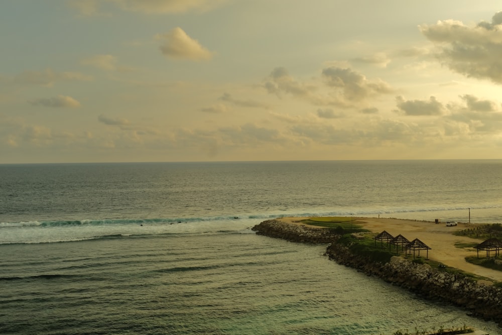 a body of water with waves coming in to shore