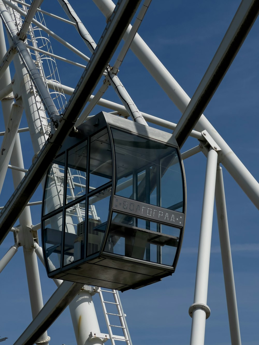 a ferris wheel with a blue sky in the background