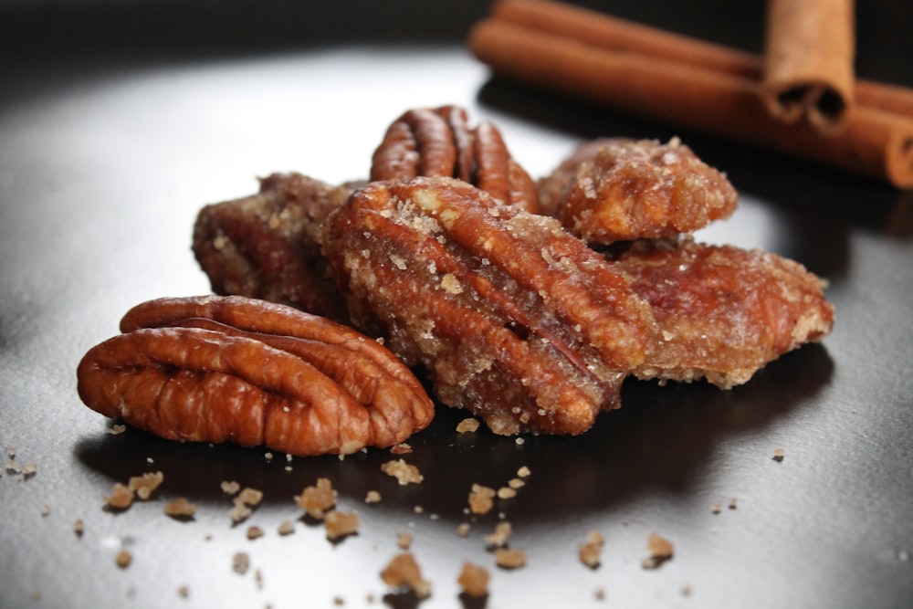 a pile of pecans sitting on top of a table