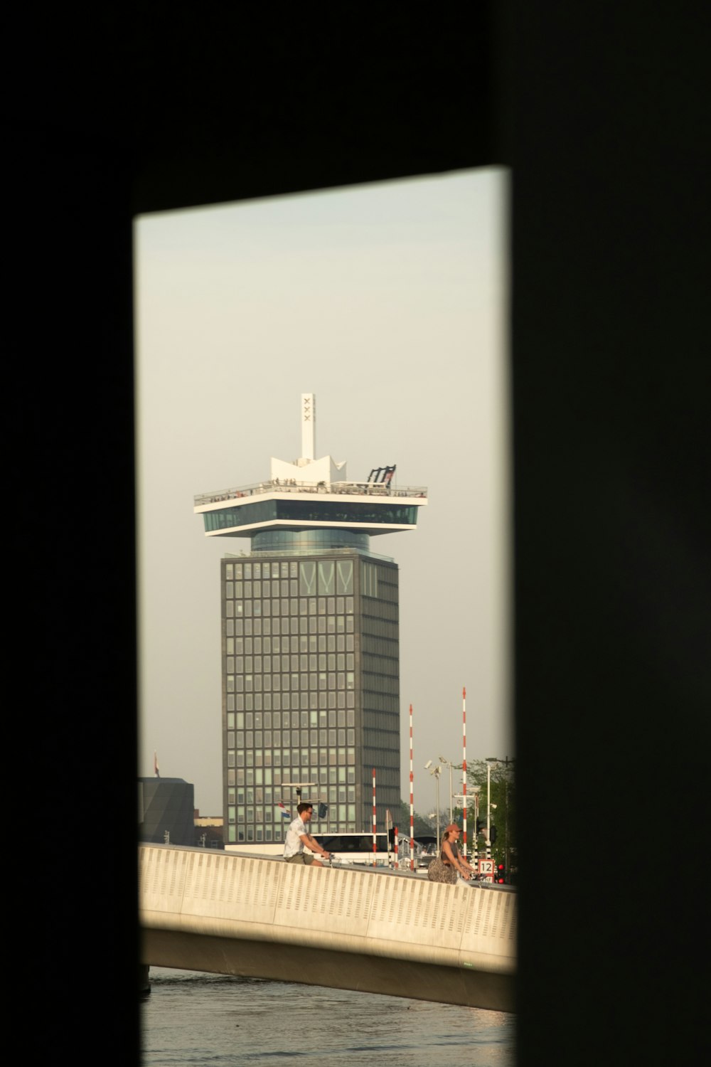 a view of a building from across the water