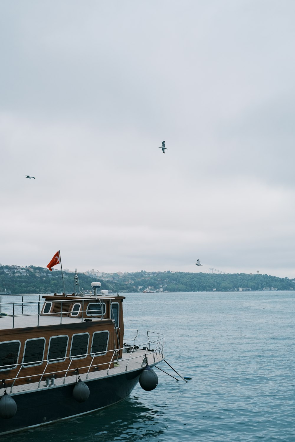 a boat floating on top of a large body of water