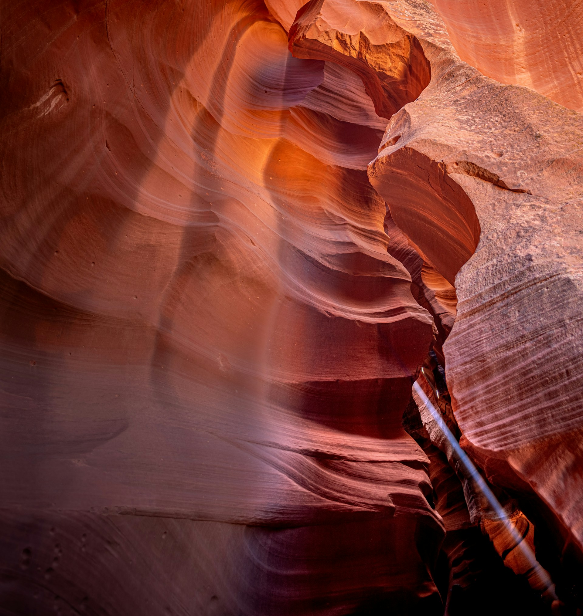 a narrow slot in the side of a canyon