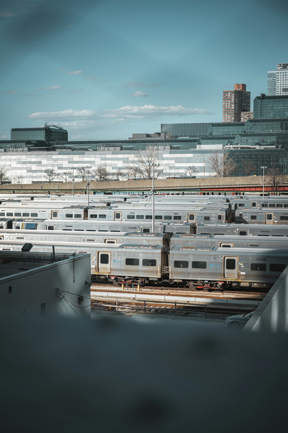 a bunch of trains that are parked in a lot