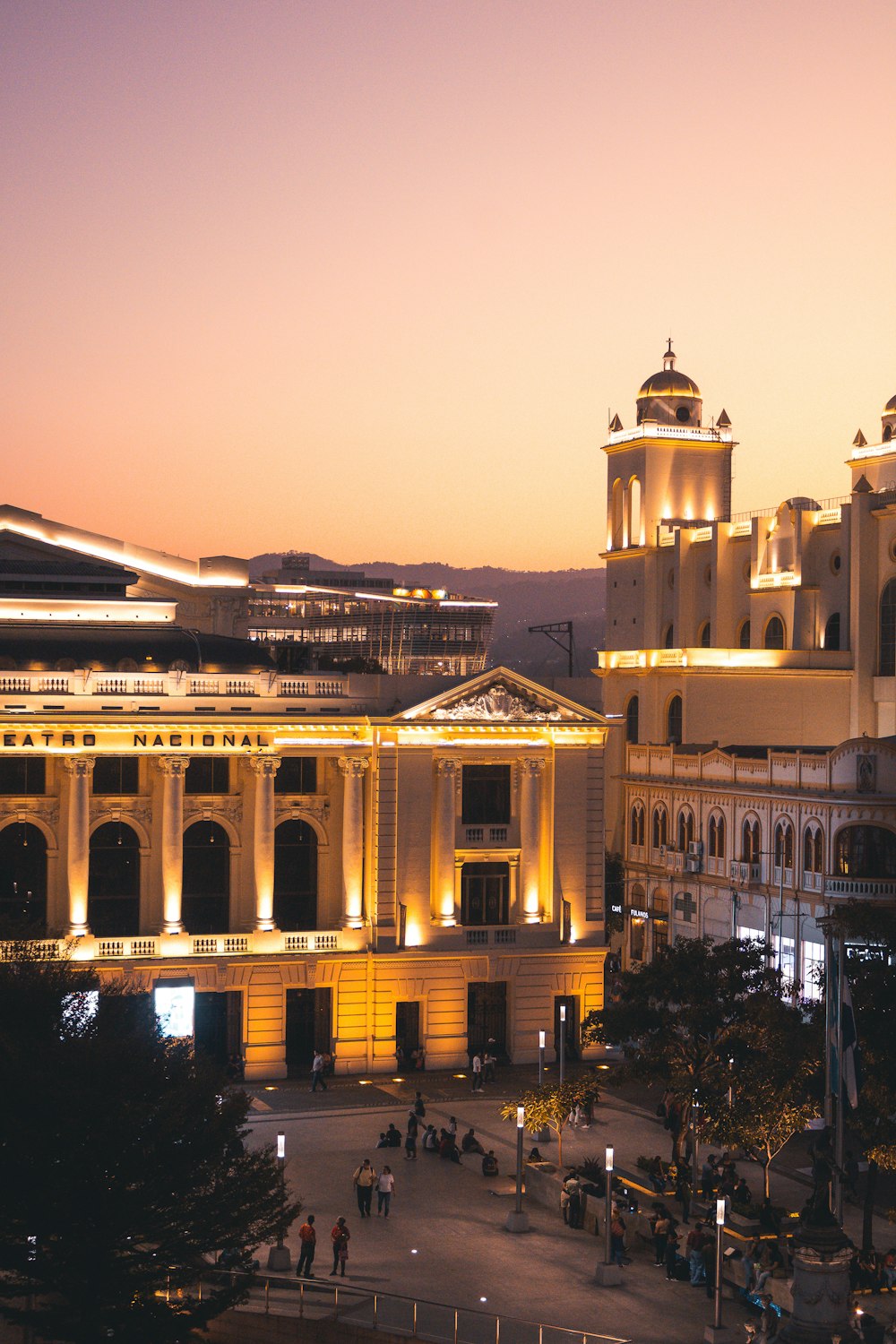 a large building with a clock tower in the middle of it