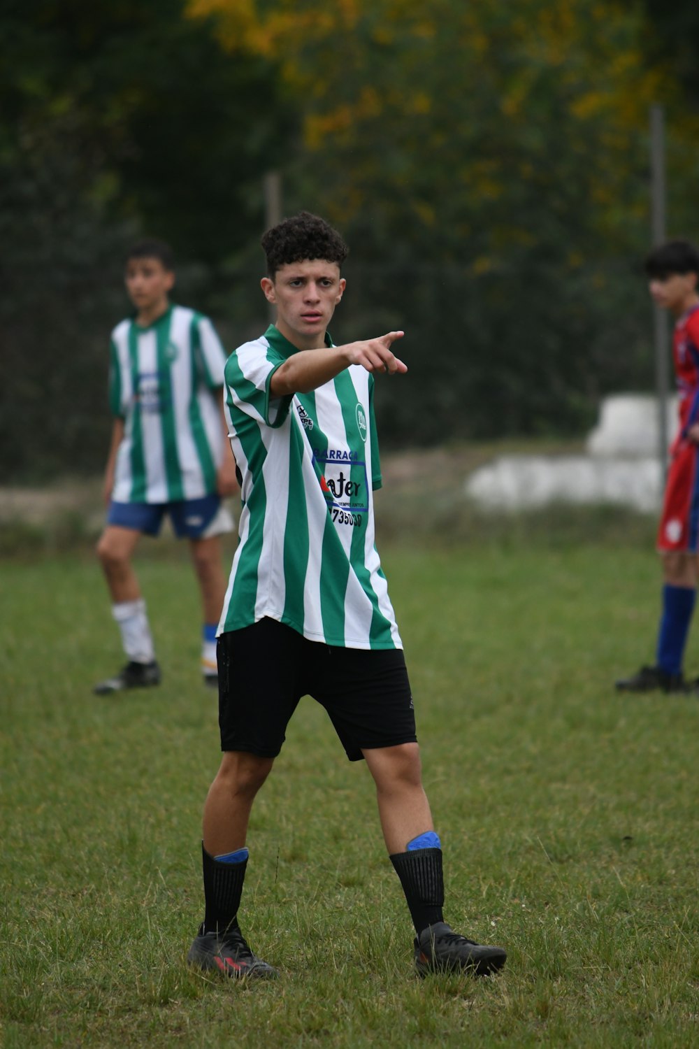 a group of young men playing a game of soccer