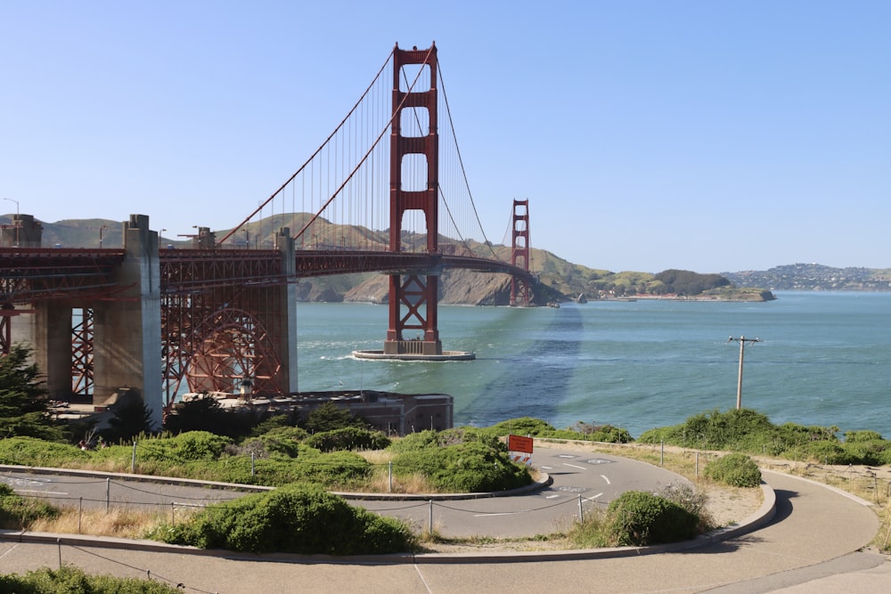 a view of the golden gate bridge from the top of a hill