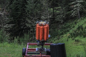 a trailer with a bunch of orange objects on it
