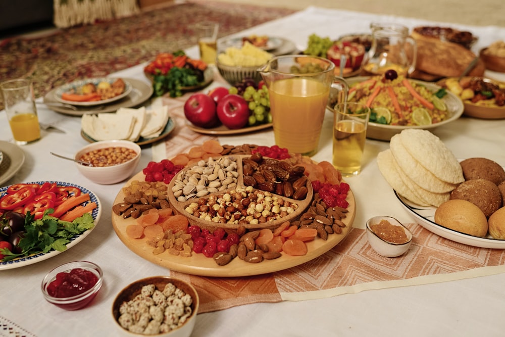 a table filled with lots of food and drinks