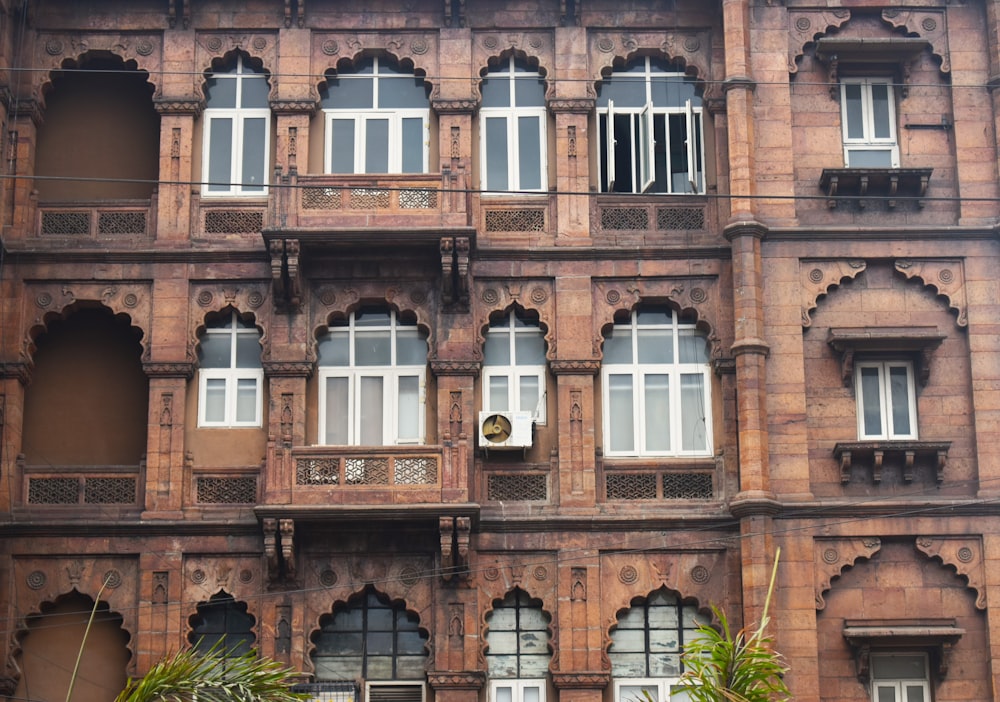 a large building with many windows and a clock