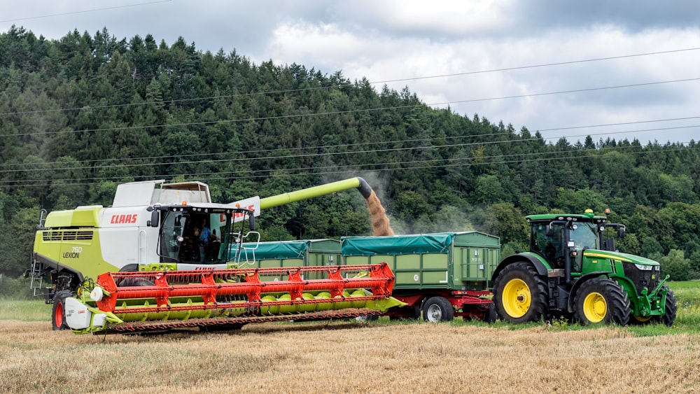 a tractor pulling a trailer with a trailer attached to it