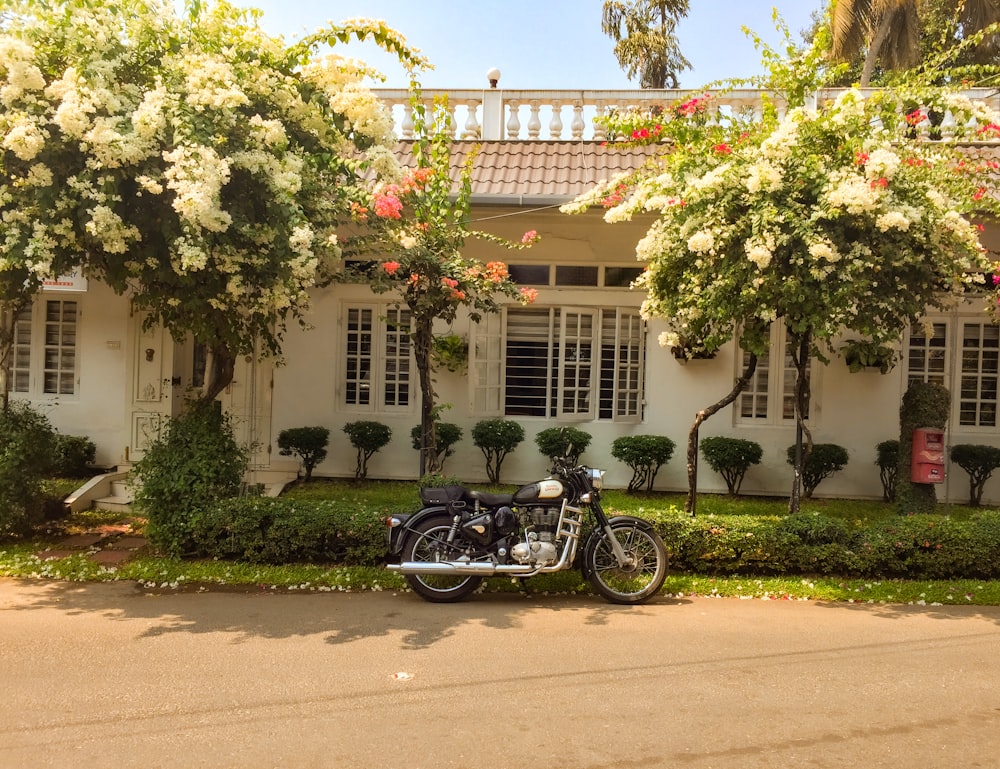 a motorcycle parked in front of a house