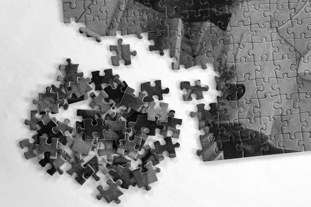 a black and white photo of a puzzle