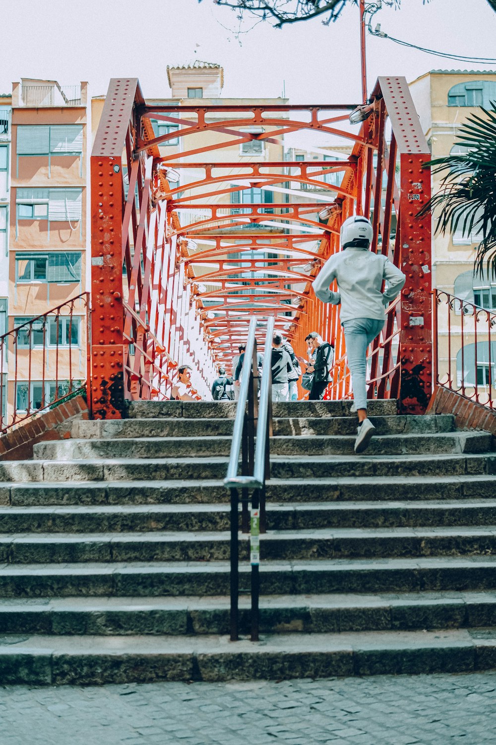 a skateboarder is going down a set of stairs